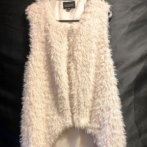 Faux fur ling vest. BEAUTIFUL and I love it.